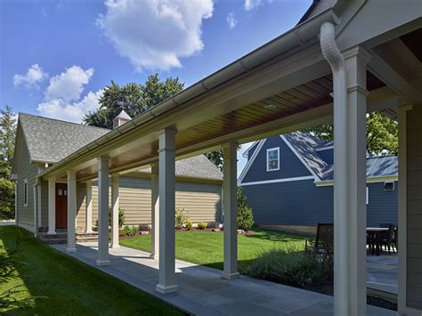 covered walkway from detached garage to house metal roof|covered garage walkway ideas.